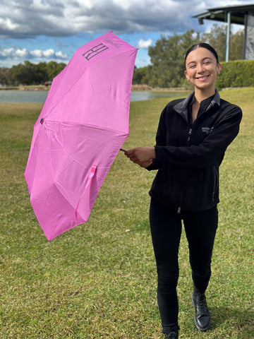 Folding pink umbrella peterson house hunter valley sparkling wine bubbles
